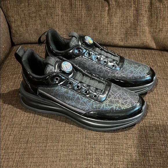 Other - Stylish Black and Patent Leather Trim Sneakers with unique twist knob laces.